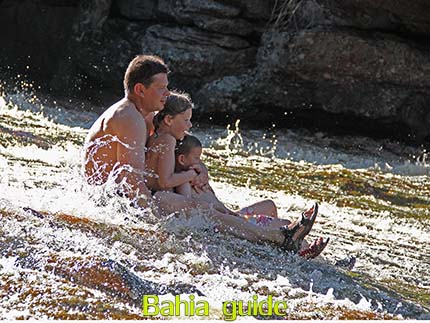 Family fun at the Ribeirão do Meio Waterfalls near Lençois, the best views while visiting Chapada Diamantiana national park, trekkings and walks while visiting Brazil's Chapada Diamantiana national park / Ivan Bahia Guide, traveling in Brazil, #IvanBahiaGuide #SalvadorBahiaBrazil #BrazilEssential #ChapadaDiamantina #ToursByLocals #GayTravelBrazil #IBG #FotosBahia #BahiaTourism #BahiaTravel #FotosChapadaDiamantina #fernandobingretourguide #BrazilTravel #ChapadaDiamantinaGuide #ChapadaDiamantinaTrekking #Chapadaadventure #BahiaMetisse #BahiaGuide #diamantinamountains #DiamondMountains #ValedoPati #PatyValley #ValeCapao #Bahia #Lençois #MorroPaiInacio (ref. Brazilian Grand Canyon)